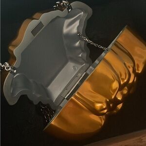 I’m selling a Versace  purse in great condition best offer takes it seriousbuyer